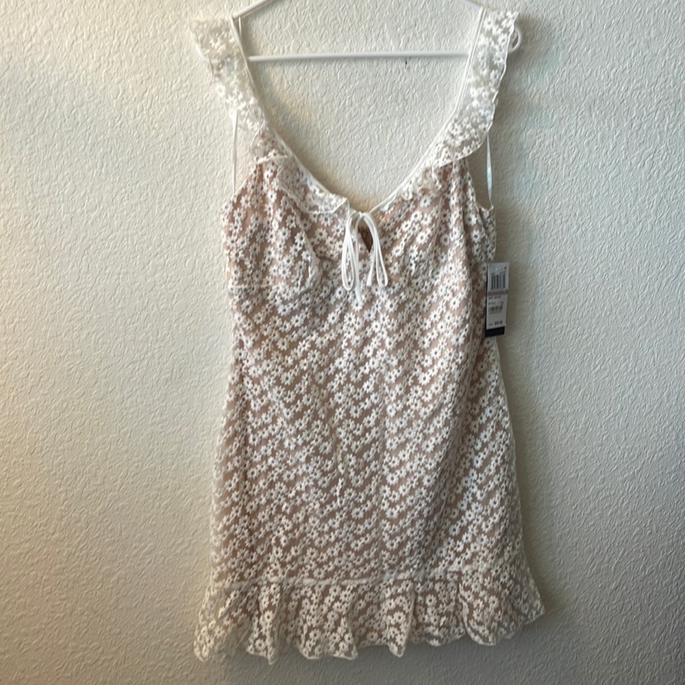 NWT size 15 White sheer floral dress with a nude lining.